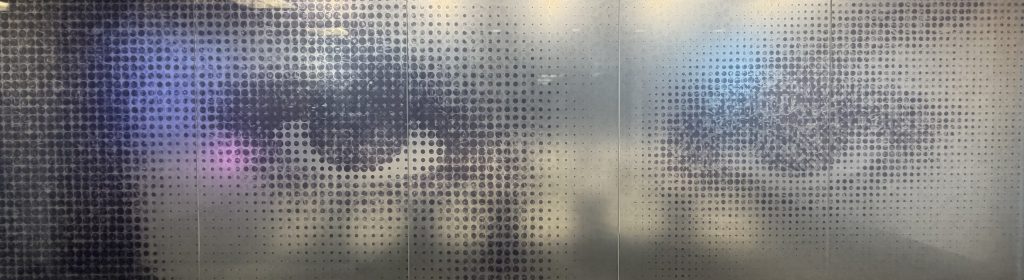 <strong>Shattered Eyes</strong><br>
Kat Tobler<br>
2021<br>
<br>
Digitally manipulated photograph on glass film